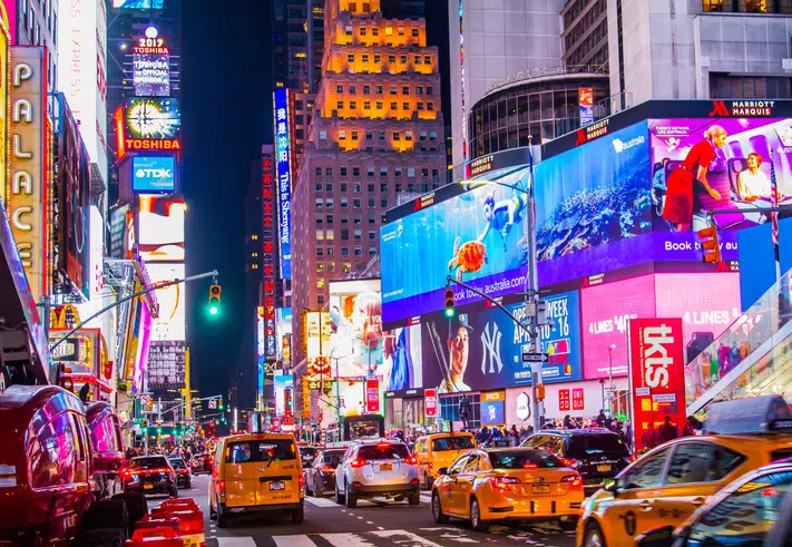 DOOH ads splattered across dozens of screens in Times Square NYC